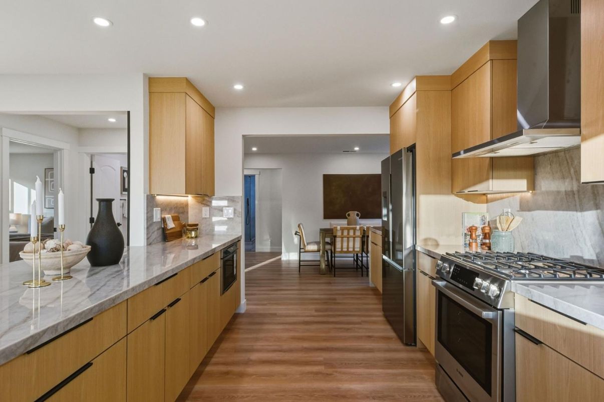 Dining room, Interior, Kitchen, Recessed Lighting, Stainless Steel Appliances, Wood Texture Flooring