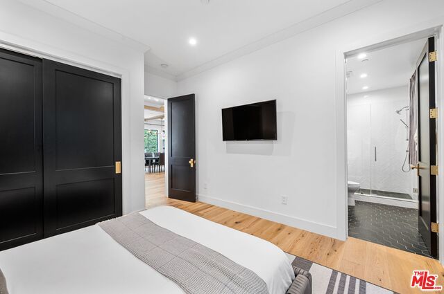 Bathroom, Bedroom, Glass Shower, Interior, Recessed Lighting, Wood Texture Flooring