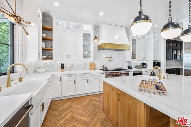 Interior, Kitchen, Marble Walls, Pendant Lights, Recessed Lighting, Stainless Steel Appliances, Wood Texture Flooring