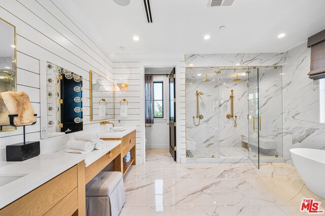 Bathroom, Dual Sink Vanities, Free Standing Baths, Glass Shower, Interior, Marble, Marble Walls, Recessed Lighting