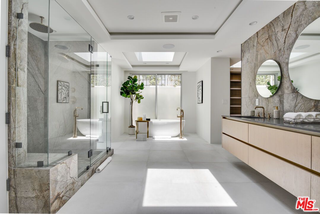 Bathroom, Dual Sink Vanities, Free Standing Baths, Glass Shower, Interior, Marble Walls, Recessed Lighting