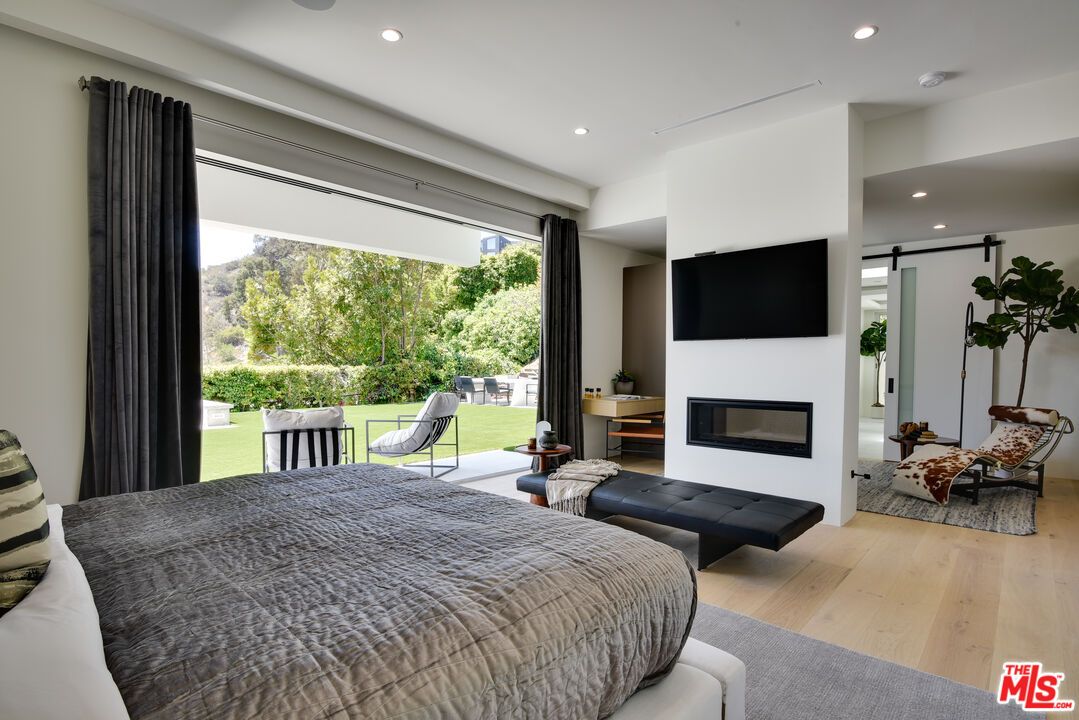 Bedroom, Fireplace, Interior, Recessed Lighting, Wood Texture Flooring