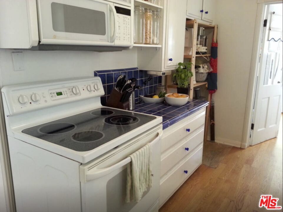Interior, Kitchen, Tile Countertops, Wood Texture Flooring