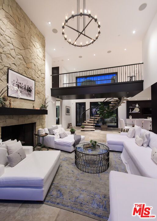 Chandelier, Dining room, Fireplace, Interior, Living room, Recessed Lighting, Stone Walls