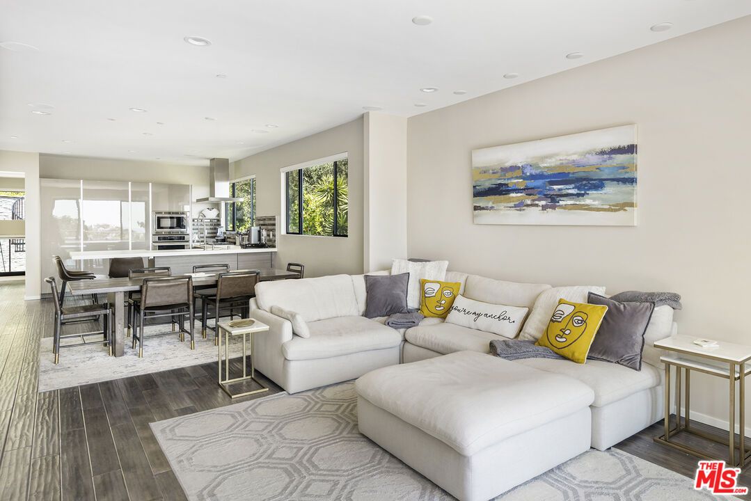 Dining room, Interior, Kitchen, Living room, Recessed Lighting, Stainless Steel Appliances, Wood Texture Flooring
