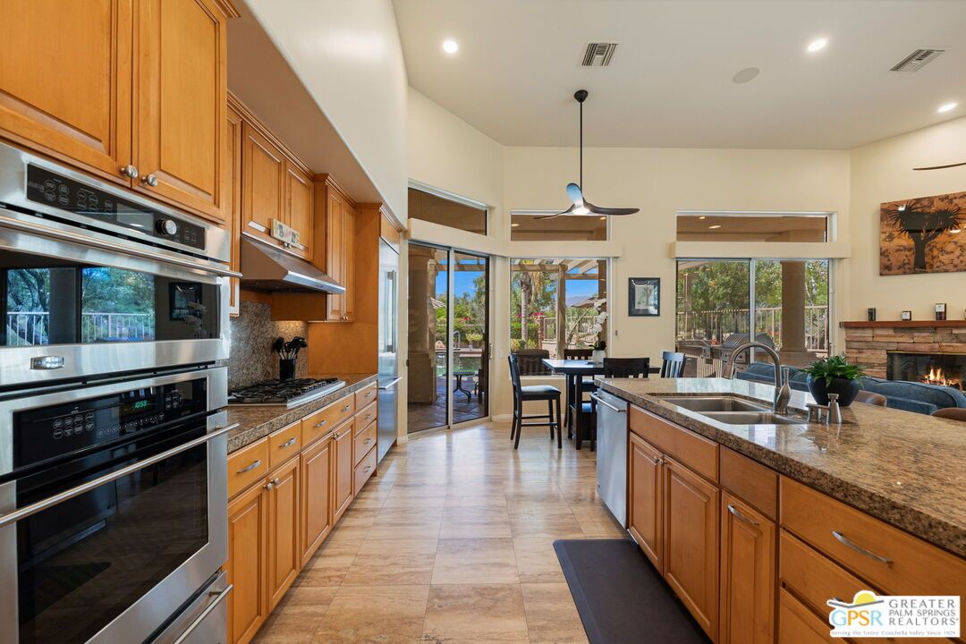 Dining room, Fireplace, Interior, Kitchen, Pendant Lights, Recessed Lighting, Stainless Steel Appliances