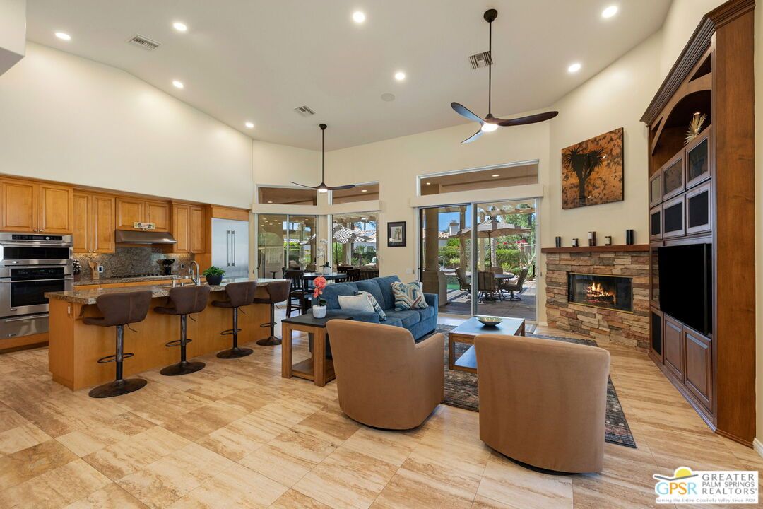 Fireplace, Interior, Kitchen, Living room, Pendant Lights, Recessed Lighting, Stainless Steel Appliances, Wood Texture Flooring