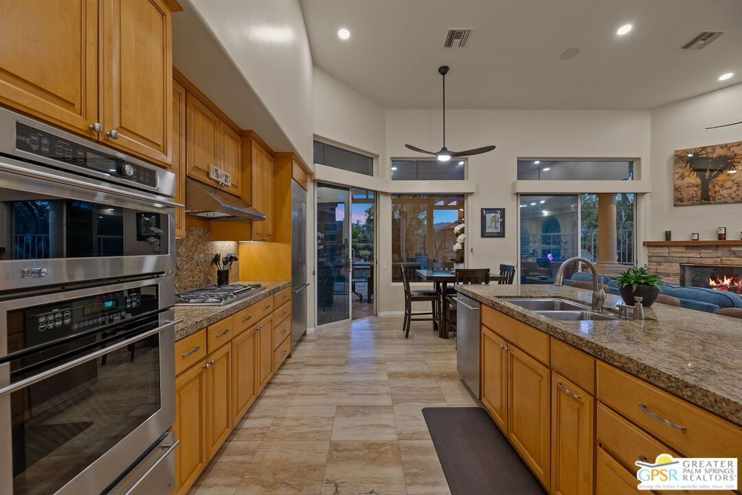 Dining room, Fireplace, Interior, Kitchen, Pendant Lights, Recessed Lighting, Stainless Steel Appliances