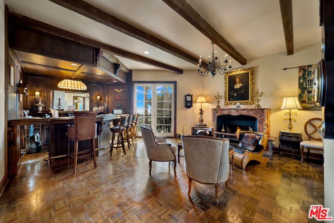 Chandelier, Dining room, Fireplace, Interior, Living room, Recessed Lighting, Wooden Beams, Wood Texture Flooring