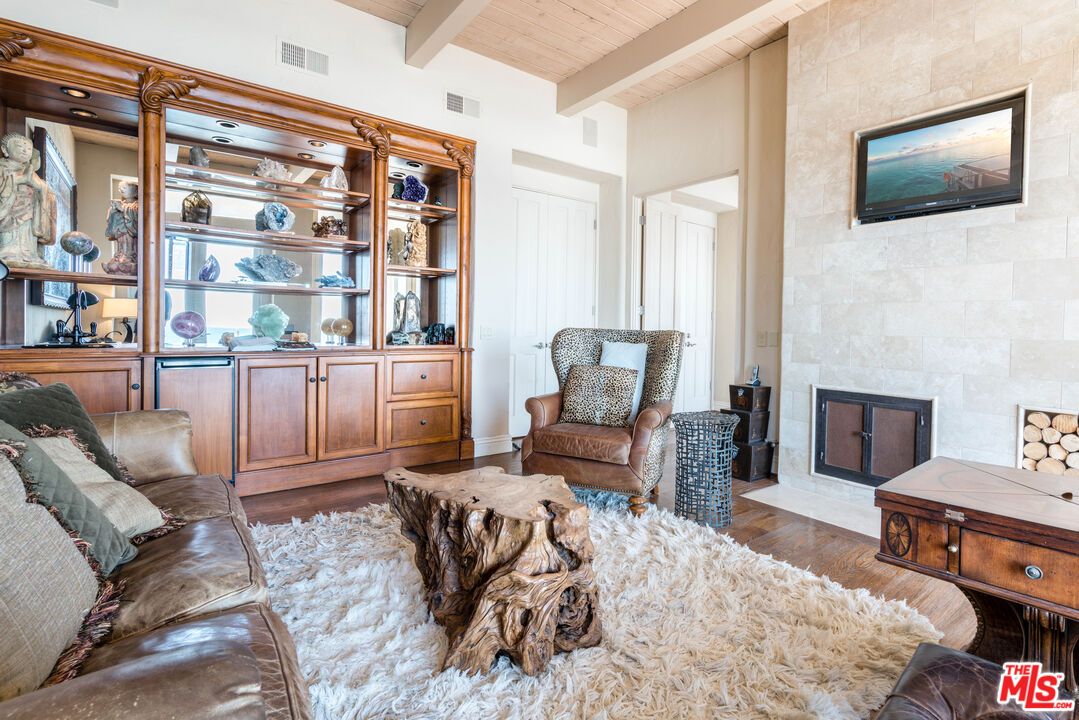 Fireplace, Interior, Living room, Recessed Lighting, Stone Walls, Wooden Beams, Wooden Ceilings, Wood Texture Flooring