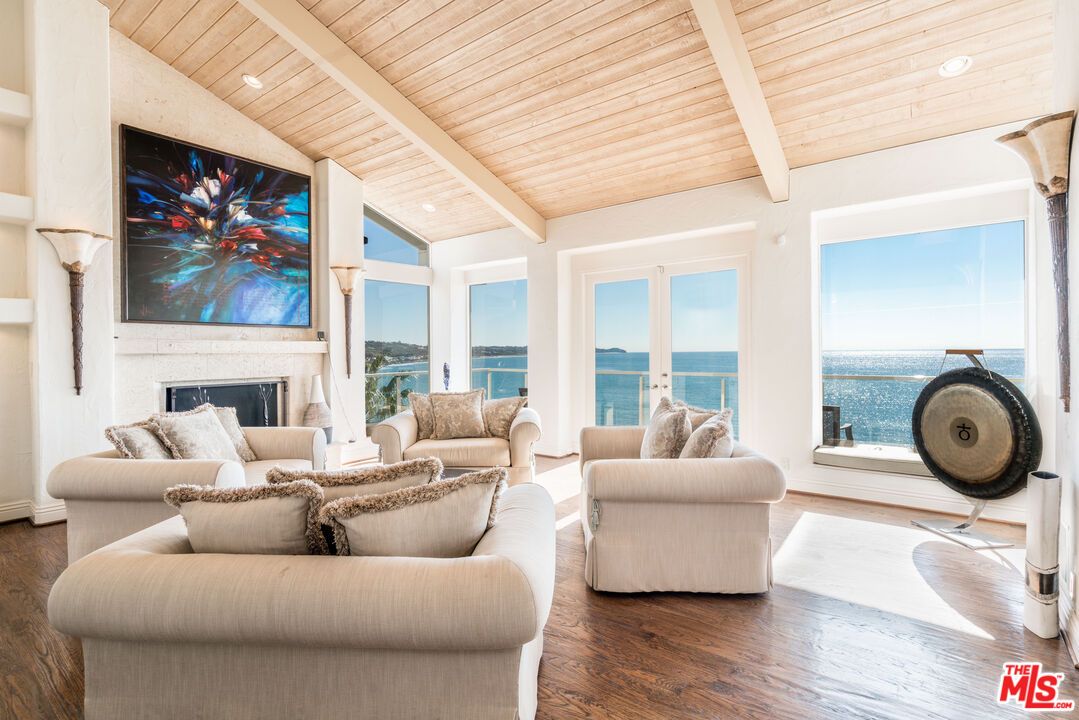 Fireplace, Interior, Living room, Recessed Lighting, Water, Wooden Ceilings, Wood Texture Flooring