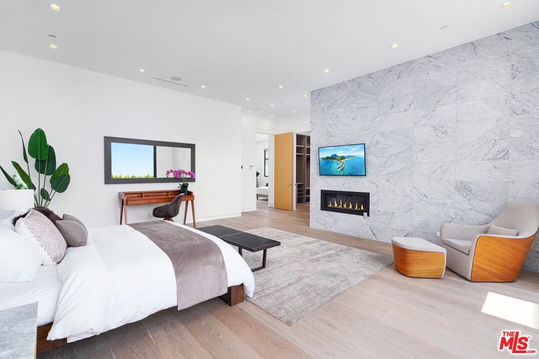 Bedroom, Fireplace, Interior, Marble Walls, Recessed Lighting, Wood Texture Flooring