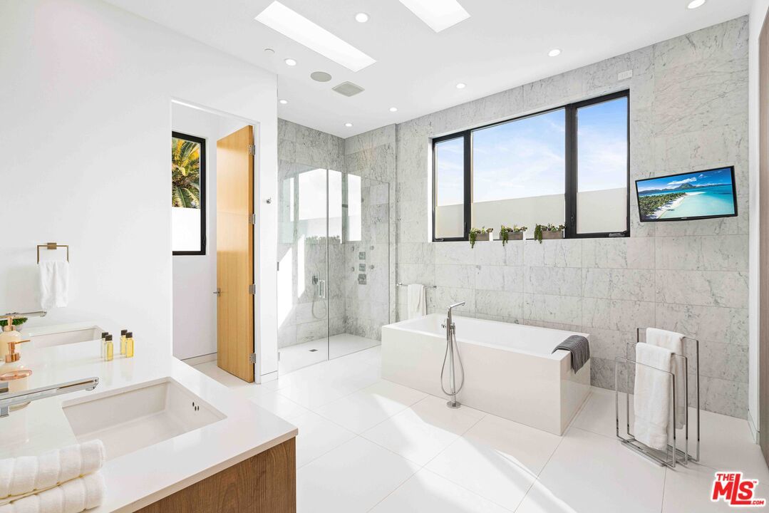 Bathroom, Free Standing Baths, Glass Shower, Interior, Marble Walls, Recessed Lighting