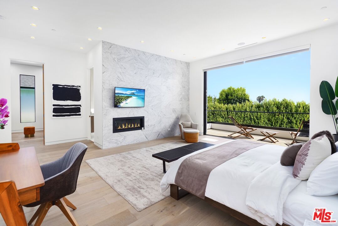 Bedroom, Fireplace, Interior, Marble Walls, Recessed Lighting, Wood Texture Flooring
