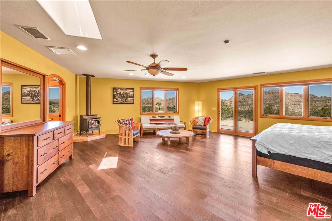 Bedroom, Fireplace, Interior, Recessed Lighting, Wood Texture Flooring