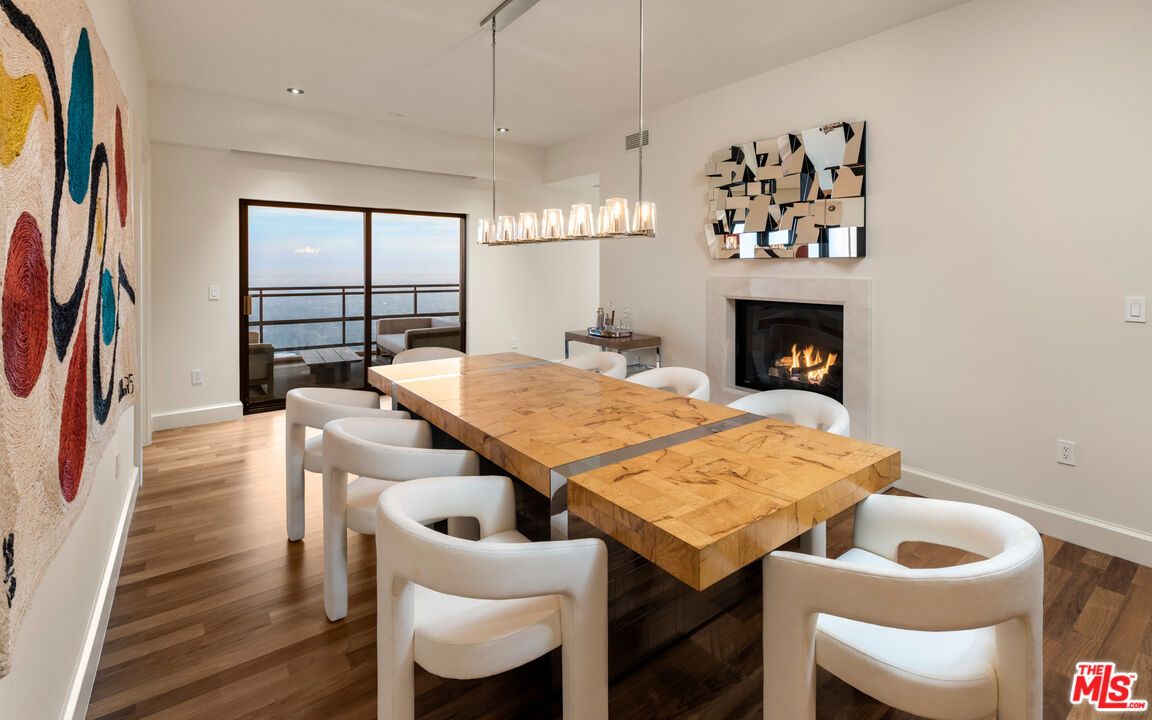 Dining room, Fireplace, Interior, Pendant Lights, Recessed Lighting, Water, Wood Texture Flooring