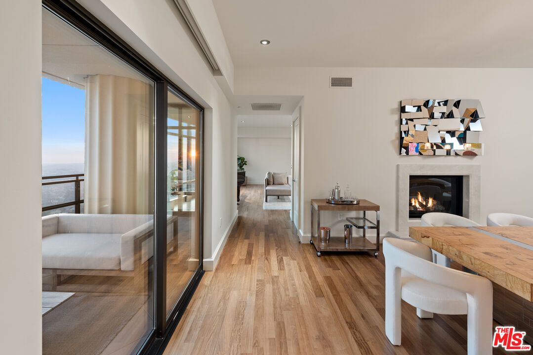 Dining room, Fireplace, Interior, Recessed Lighting, Water, Wood Texture Flooring