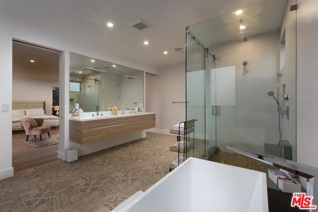 Bathroom, Bedroom, Dual Sink Vanities, Free Standing Baths, Glass Shower, Interior, Recessed Lighting, Wood Texture Flooring