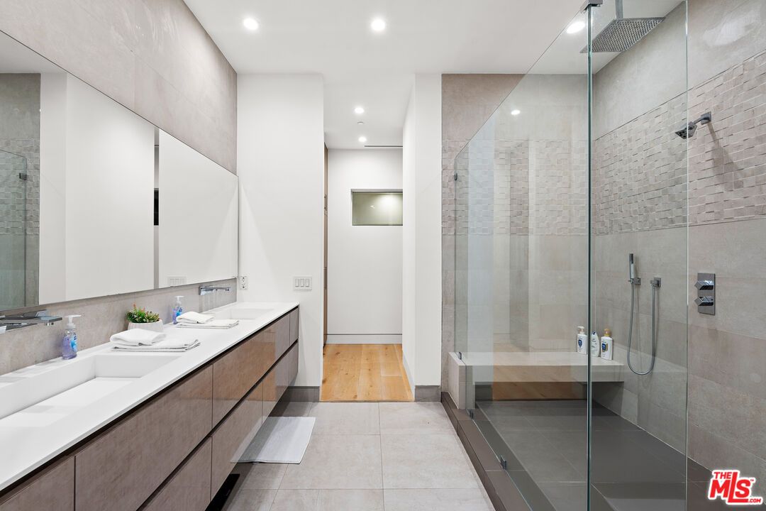 Bathroom, Dual Sink Vanities, Glass Shower, Interior, Recessed Lighting, Wood Texture Flooring