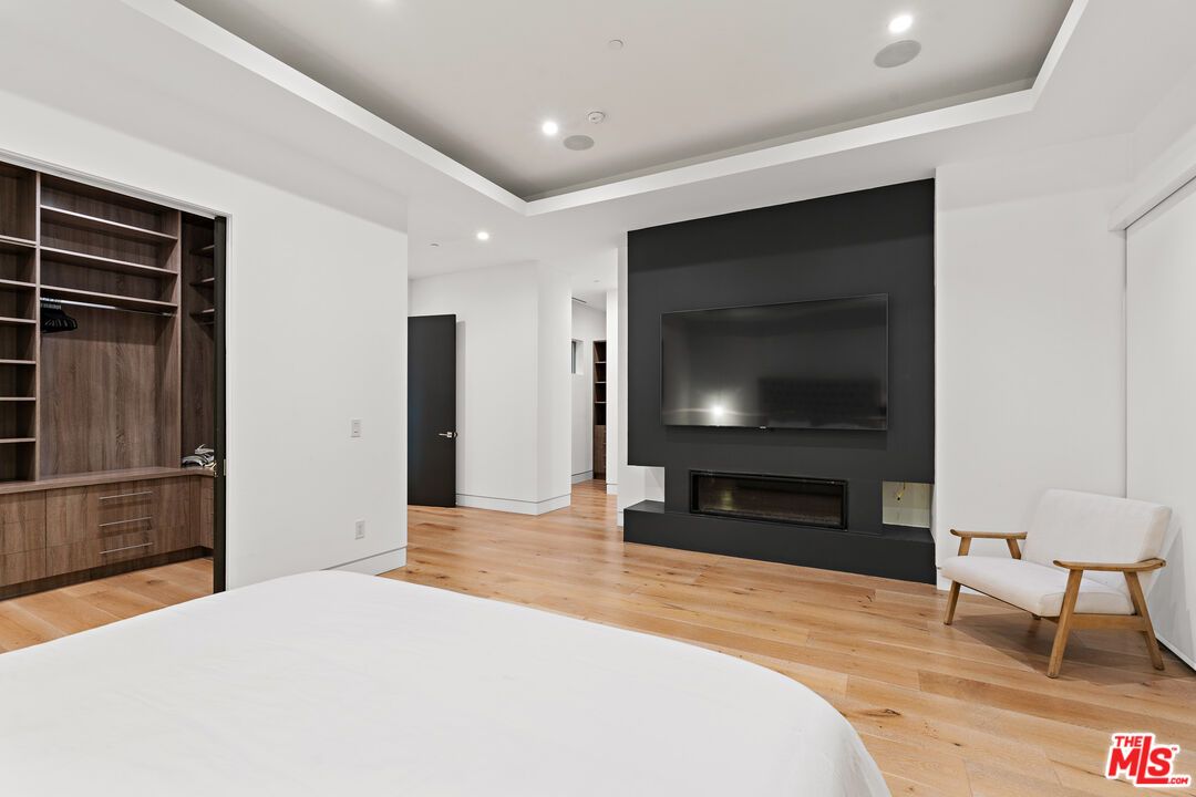 Bedroom, Fireplace, Interior, Recessed Lighting, Wood Texture Flooring