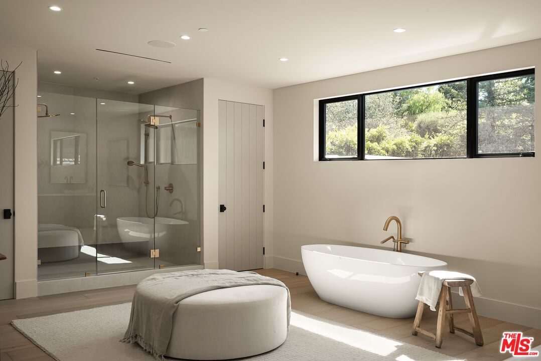 Bathroom, Free Standing Baths, Glass Shower, Interior, Recessed Lighting, Wood Texture Flooring