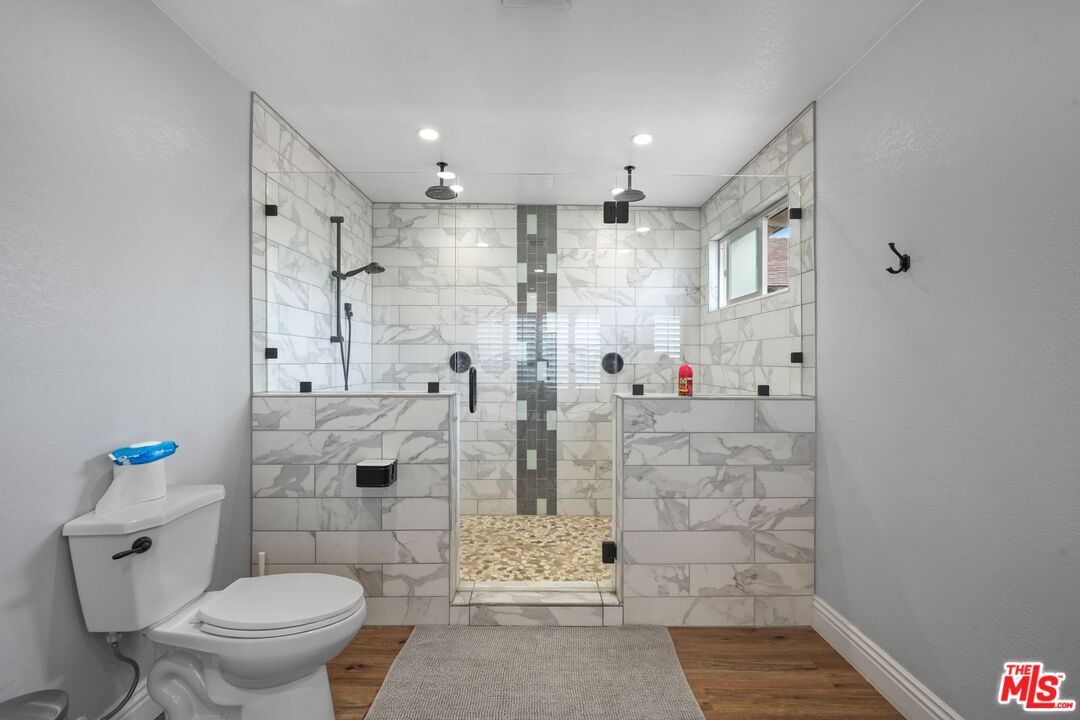 Bathroom, Glass Shower, Interior, Marble Walls, Recessed Lighting, Wood Texture Flooring