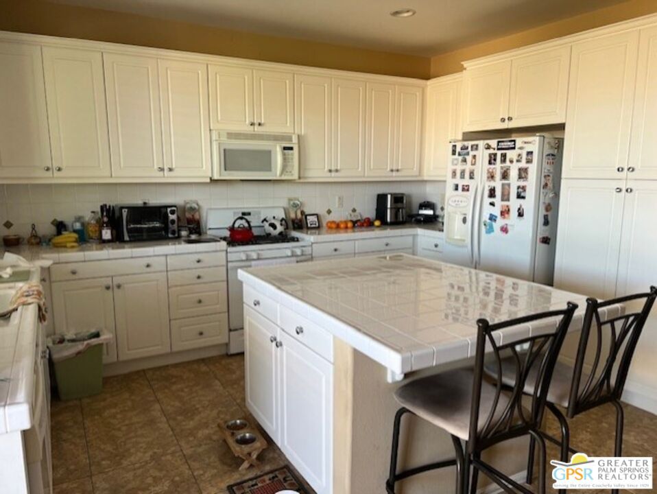 Interior, Kitchen, Recessed Lighting, Tile Countertops