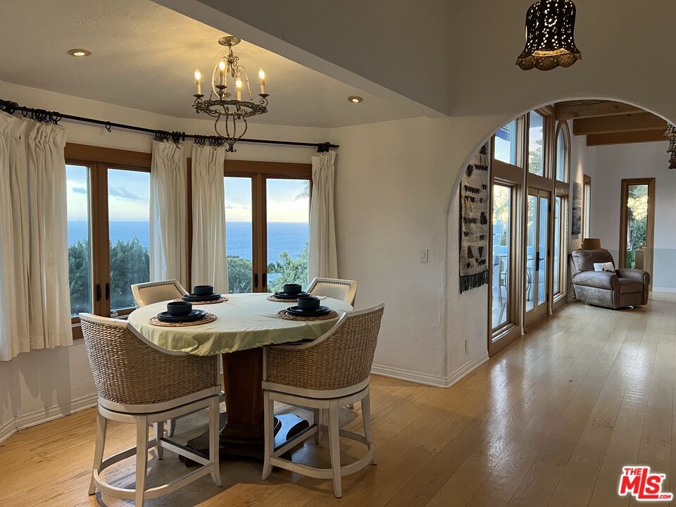 Chandelier, Dining room, Interior, Recessed Lighting, Water, Wood Texture Flooring