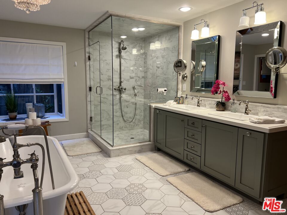 Bathroom, Dual Sink Vanities, Glass Shower, Interior, Marble Walls, Recessed Lighting