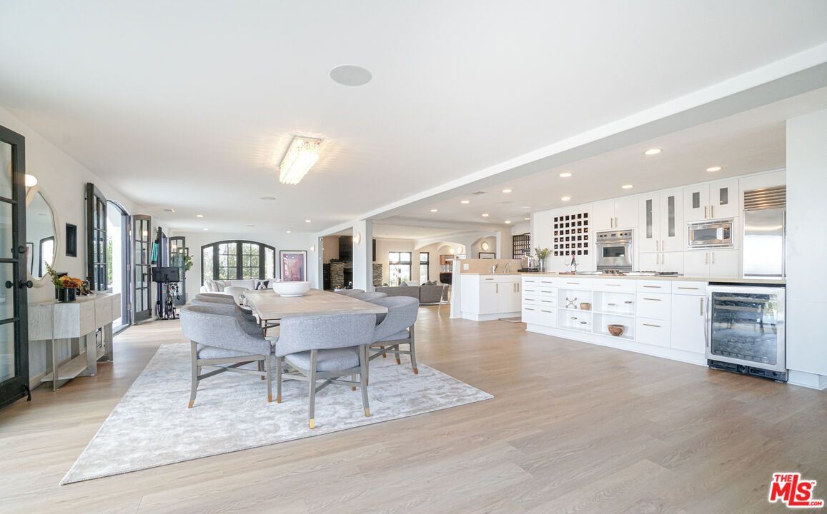Dining room, Interior, Kitchen, Recessed Lighting, Stainless Steel Appliances, Wood Texture Flooring