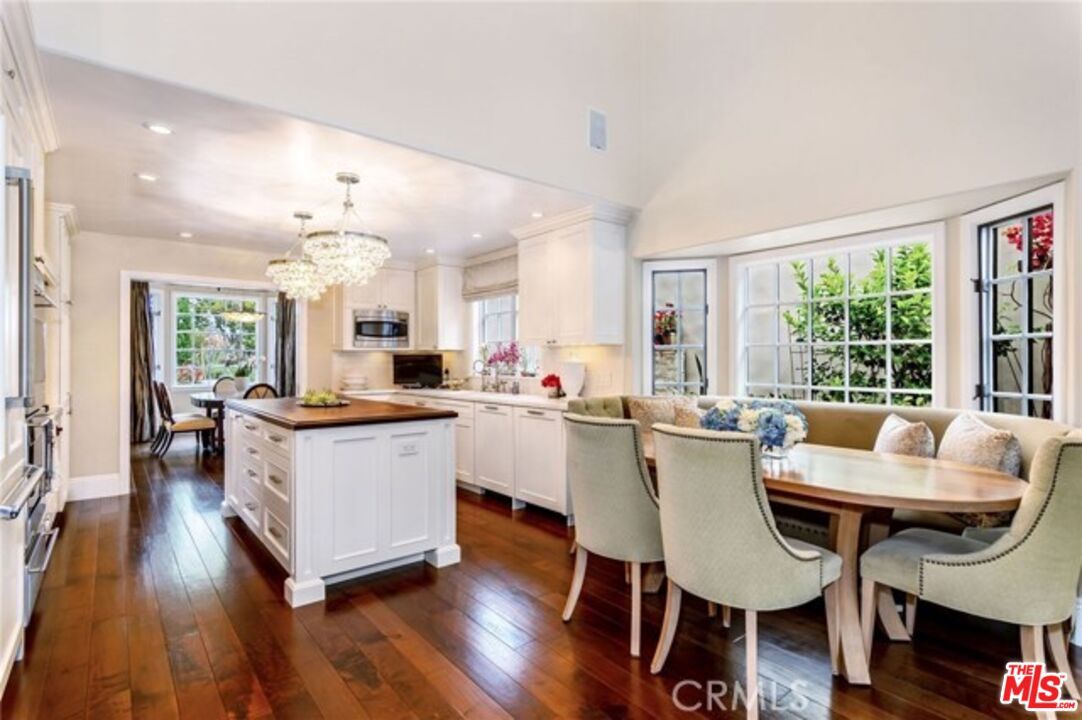 Chandelier, Dining room, Interior, Kitchen, Living room, Recessed Lighting, Stainless Steel Appliances, Wood Texture Flooring