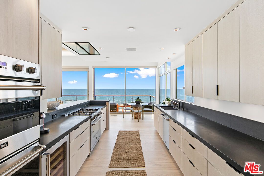 Dining room, Interior, Kitchen, Recessed Lighting, Stainless Steel Appliances, Water, Wood Texture Flooring