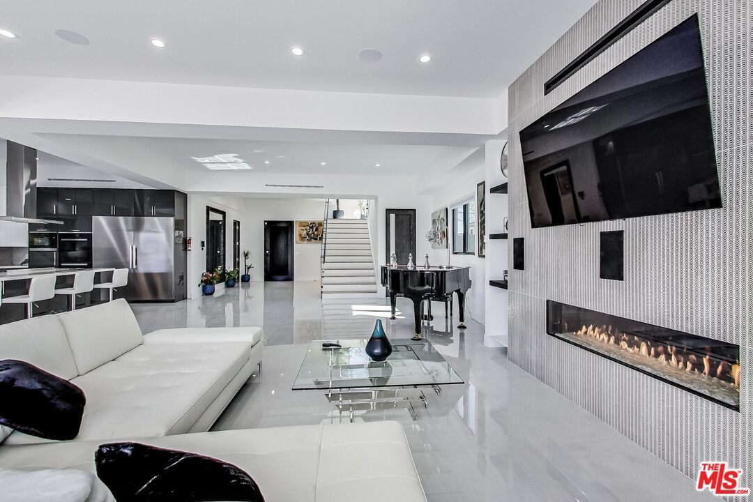 Fireplace, Interior, Kitchen, Living room, Piano, Recessed Lighting, Stainless Steel Appliances