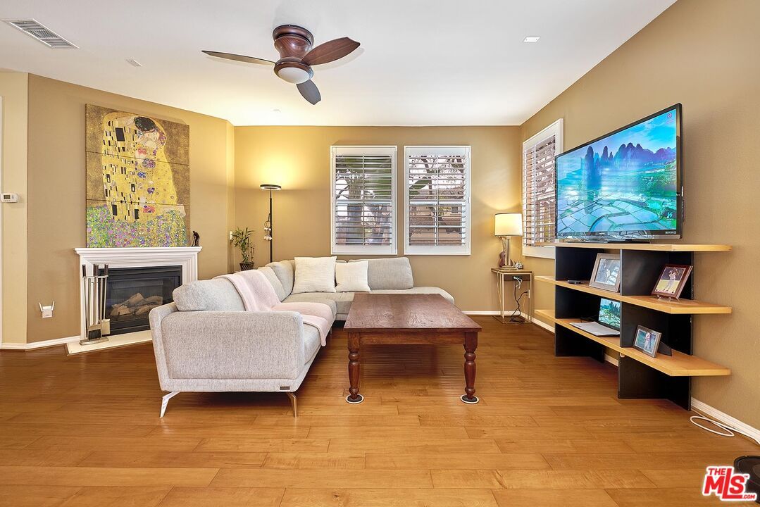 Fireplace, Interior, Living room, Recessed Lighting, Wood Texture Flooring