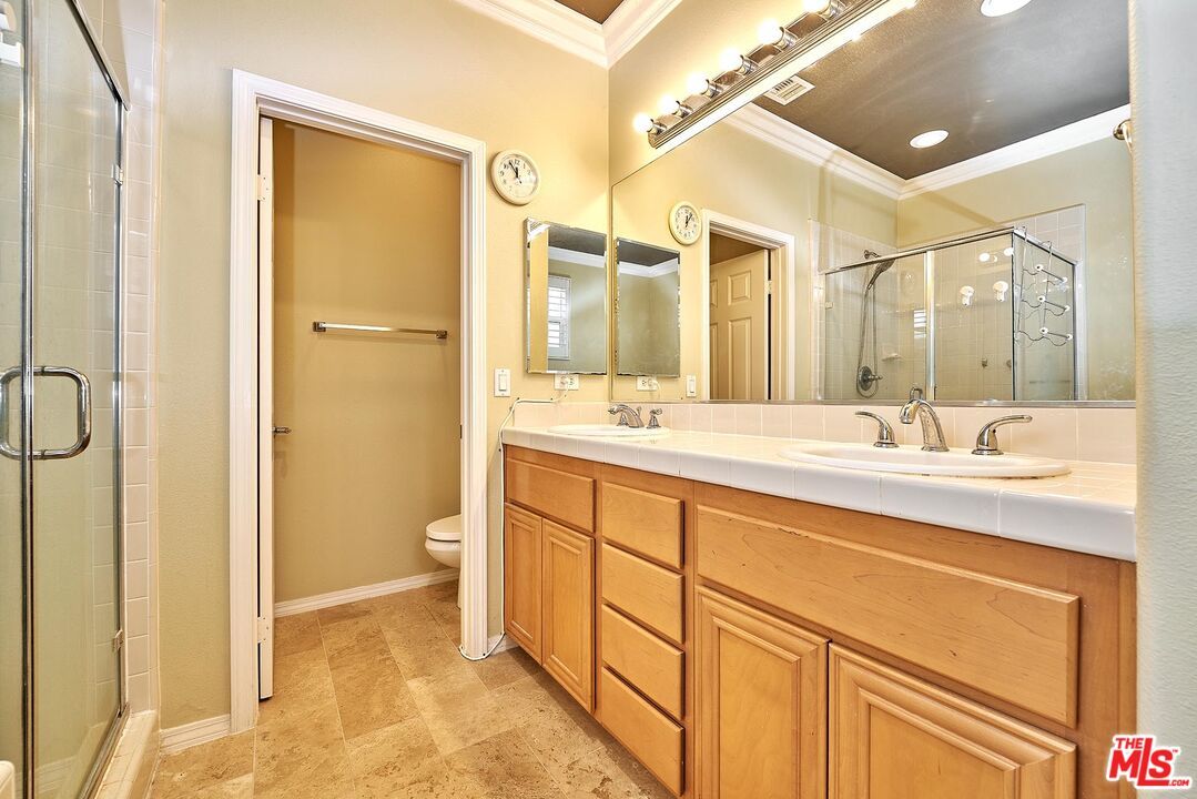 Bathroom, Dual Sink Vanities, Glass Shower, Interior, Recessed Lighting, Tile Countertops