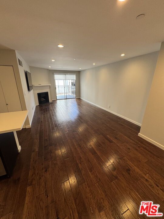 Empty room, Fireplace, Interior, Recessed Lighting, Wood Texture Flooring