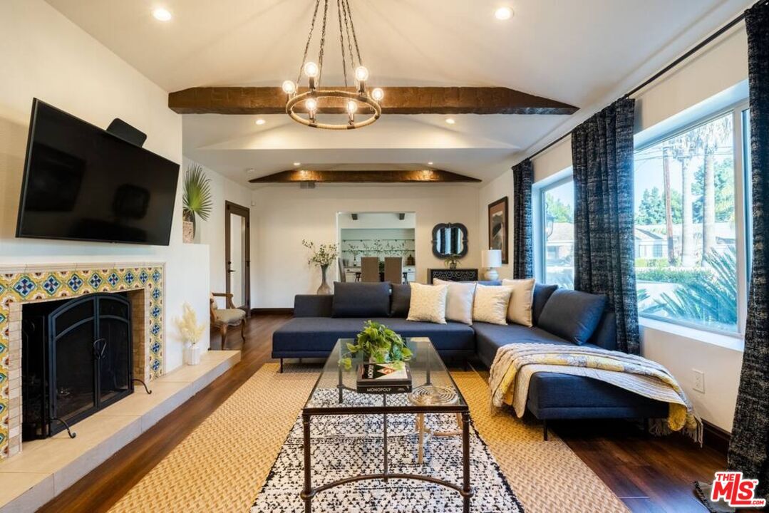 Fireplace, Interior, Living room, Pendant Lights, Recessed Lighting, Wooden Beams, Wood Texture Flooring