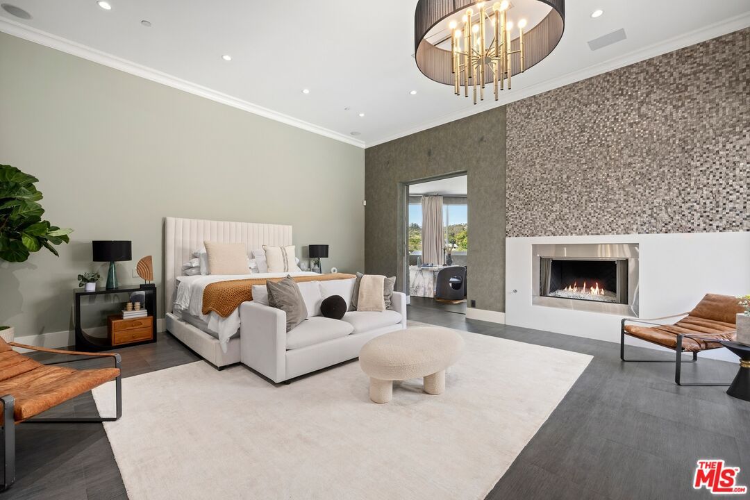 Bedroom, Chandelier, Fireplace, Interior, Recessed Lighting, Wood Texture Flooring