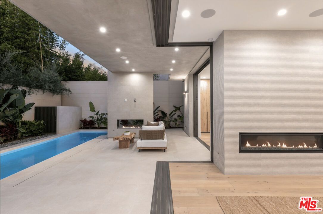 Fireplace, Interior, Pool, Recessed Lighting, Wood Texture Flooring