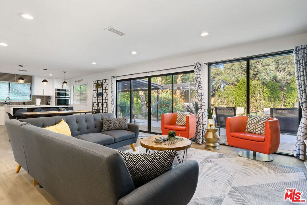 Dining room, Interior, Kitchen, Living room, Pendant Lights, Recessed Lighting, Stainless Steel Appliances, Wood Texture Flooring