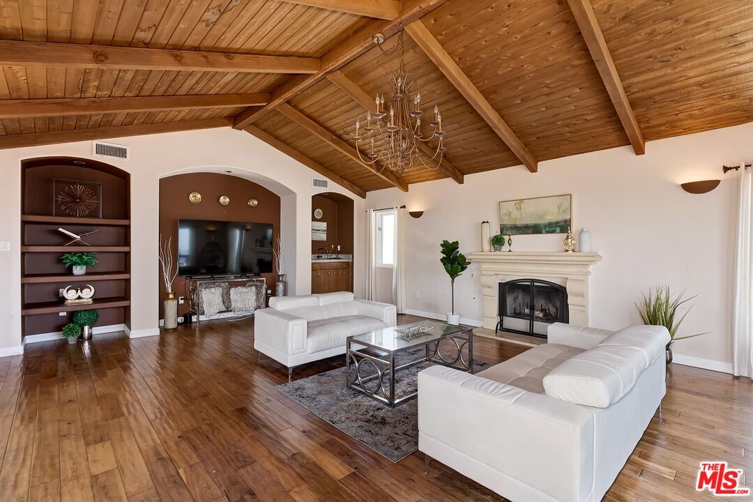 Chandelier, Fireplace, Interior, Living room, Wooden Beams, Wooden Ceilings, Wood Texture Flooring