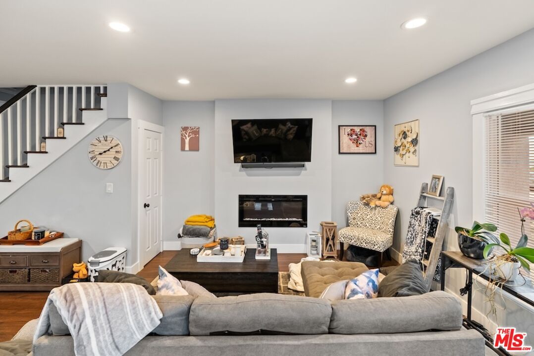 Fireplace, Interior, Living room, Recessed Lighting, Wood Texture Flooring