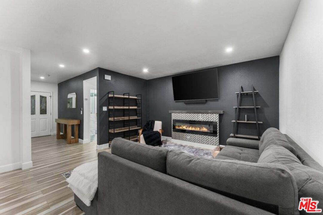 Fireplace, Interior, Living room, Recessed Lighting, Wood Texture Flooring