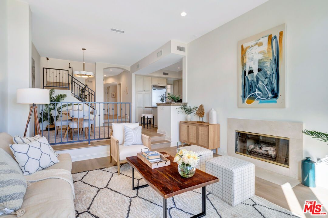 Dining room, Fireplace, Interior, Living room, Pendant Lights, Recessed Lighting, Wood Texture Flooring