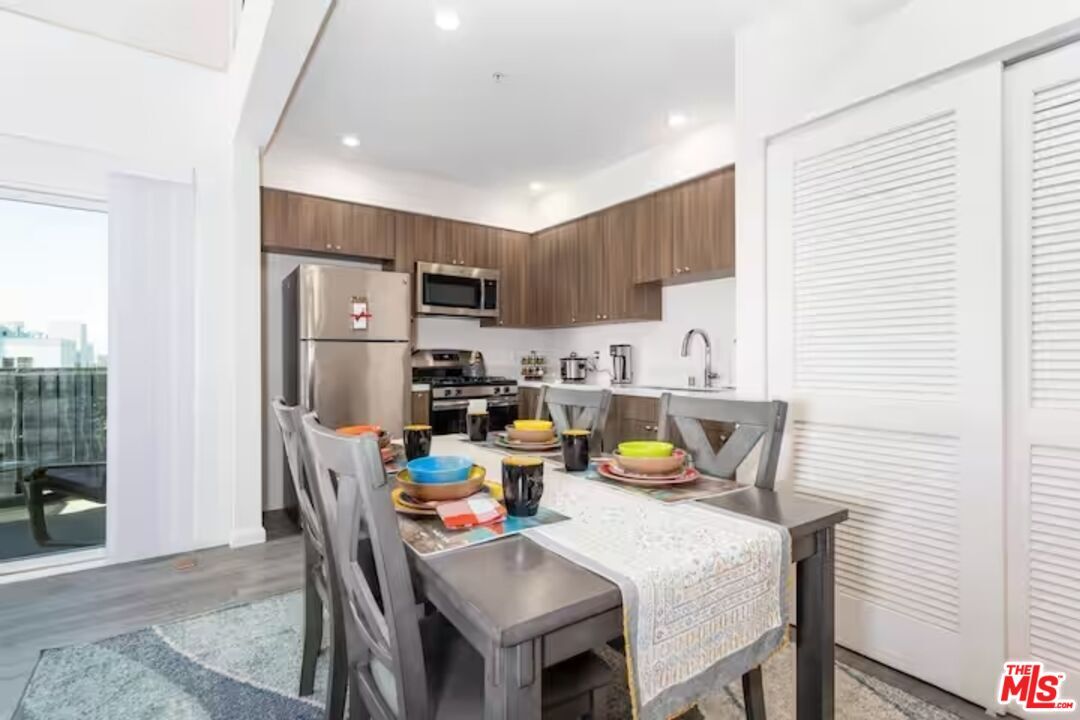 Dining room, Interior, Kitchen, Recessed Lighting, Stainless Steel Appliances, Wood Texture Flooring
