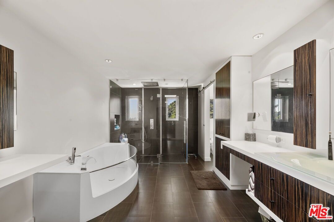 Bathroom, Dual Sink Vanities, Glass Shower, Interior, Recessed Lighting, Wood Texture Flooring