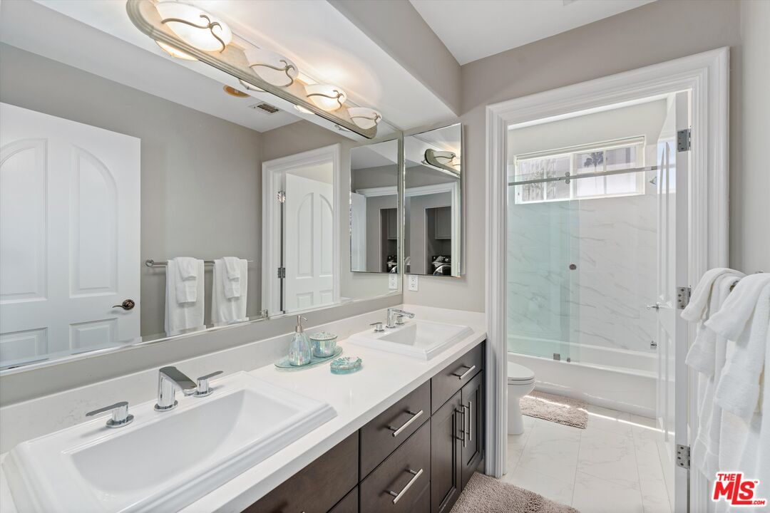 Bathroom, Dual Sink Vanities, Glass Shower, Interior, Marble, Marble Walls