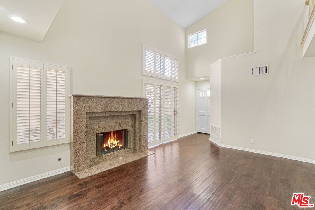 Empty room, Fireplace, Interior, Recessed Lighting, Wood Texture Flooring