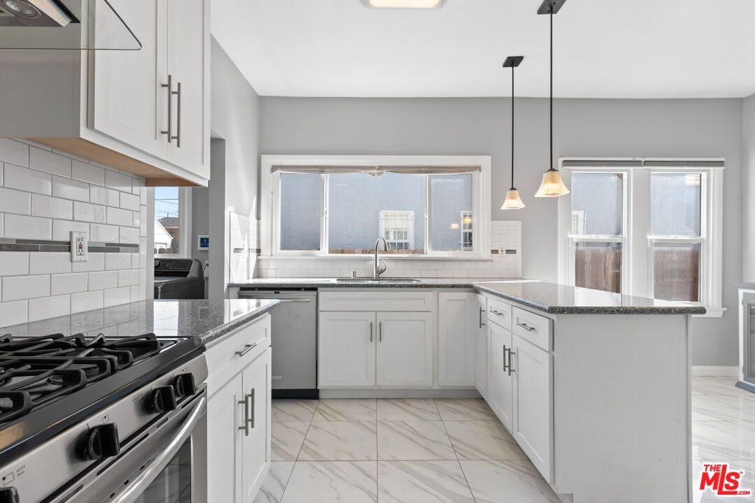 Interior, Kitchen, Marble, Pendant Lights, Stainless Steel Appliances