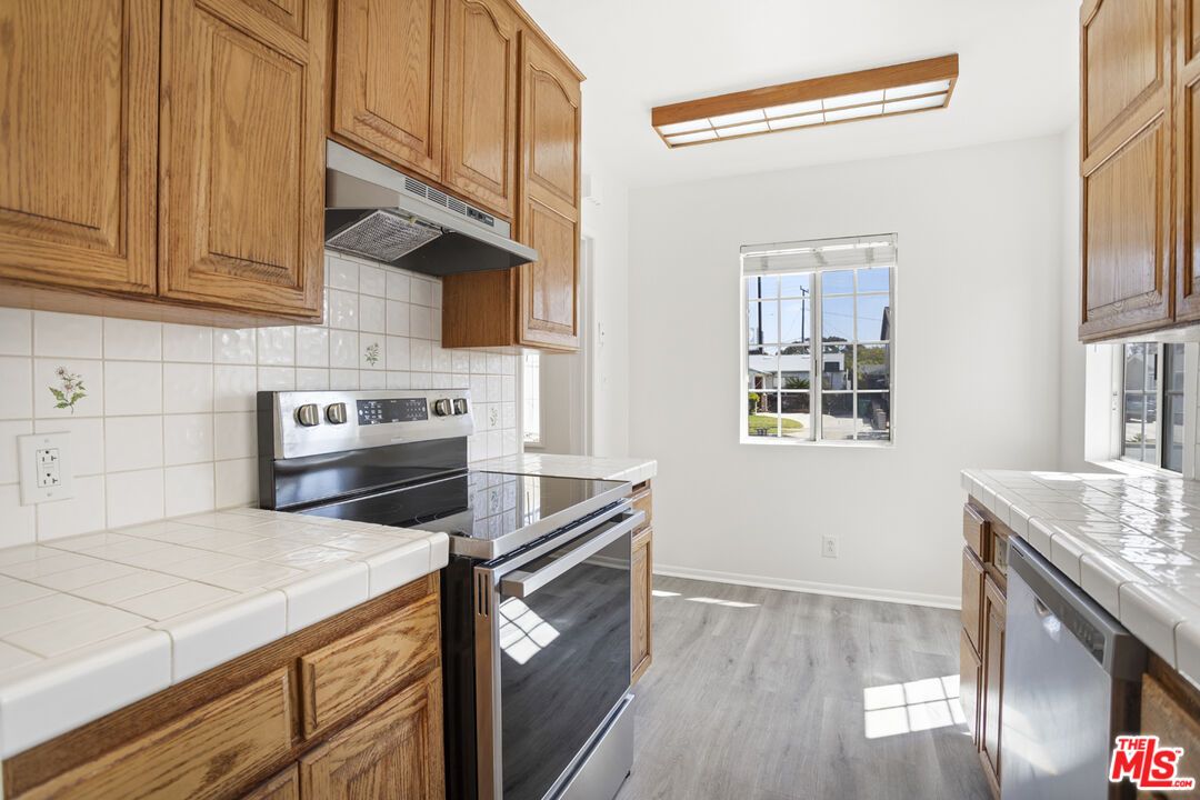 Interior, Kitchen, Tile Countertops, Wood Texture Flooring